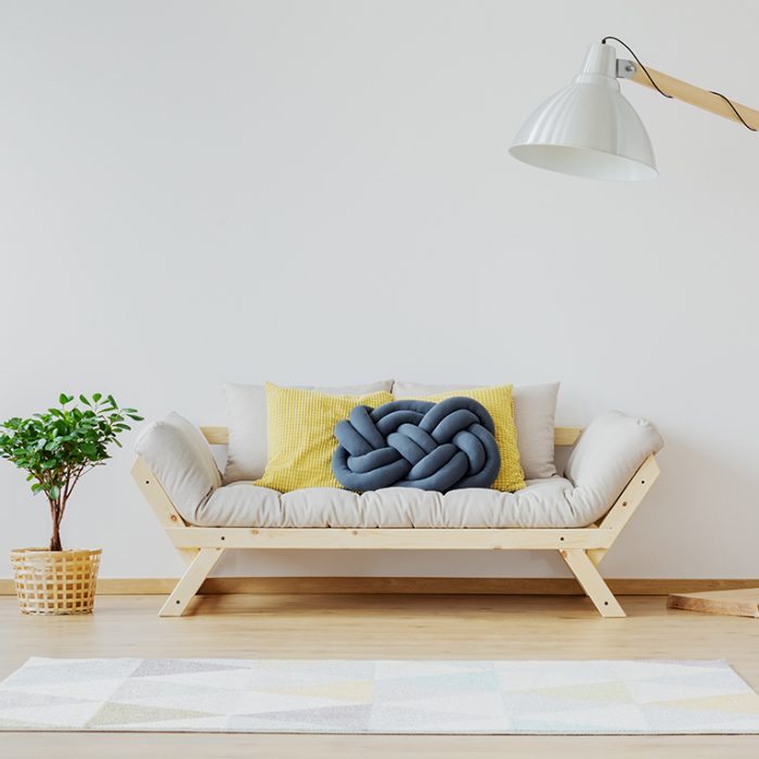 Designer, wooden furniture in bright, spacious room
