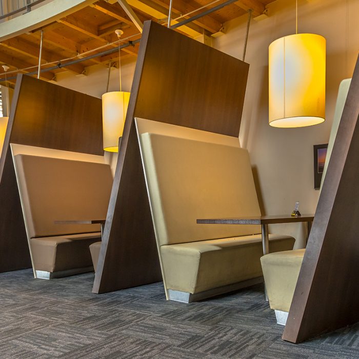 Modern restaurant booth seats in brown shades