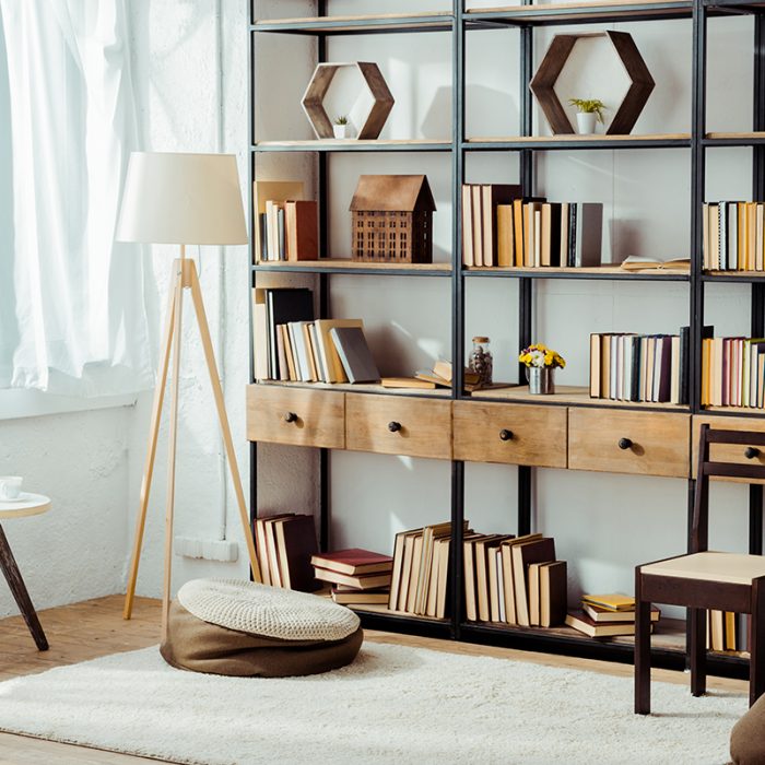 interior of living room with wooden furniture and books